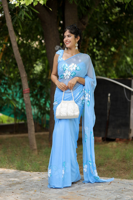 Blue Majesty (Handpainted Chiffon Saree in Blue)