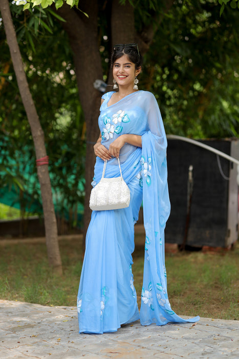 Blue Majesty (Handpainted Chiffon Saree in Blue)