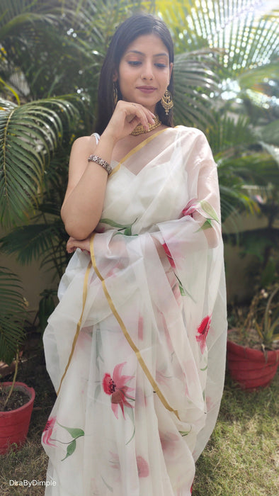 Delicate Pearl (Handpainted White Organza Zari border saree)