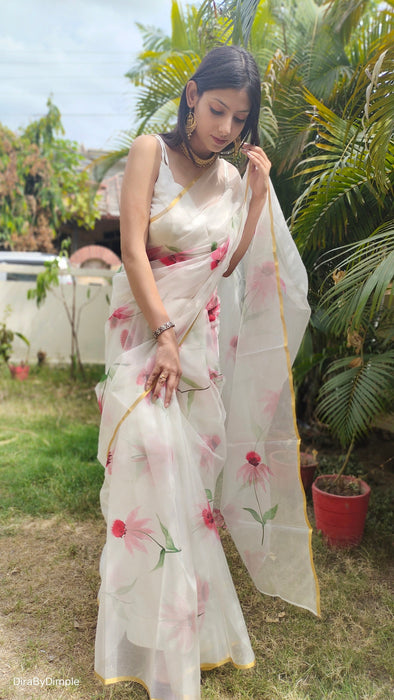 Delicate Pearl (Handpainted White Organza Zari border saree)