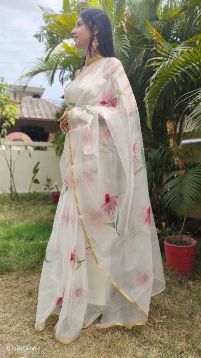 Delicate Pearl (Handpainted White Organza Zari border saree)