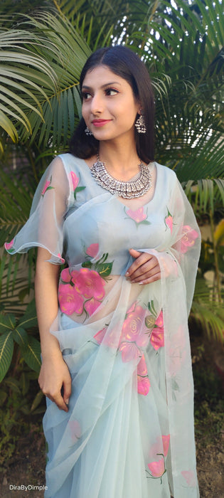 Brilliant Brushstrokes (Handpainted Silk Organza Saree in Powder Blue)