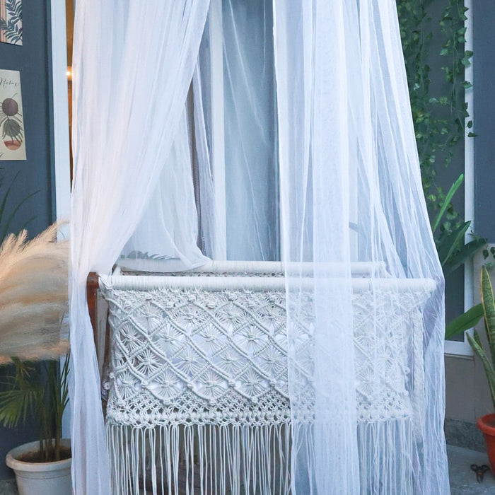 Macrame rocking cradle