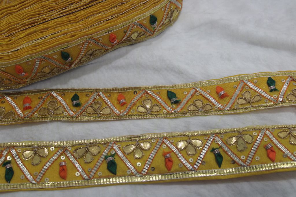 Golden Radiance: Yellow Gota Trim with Multicolor Handwork