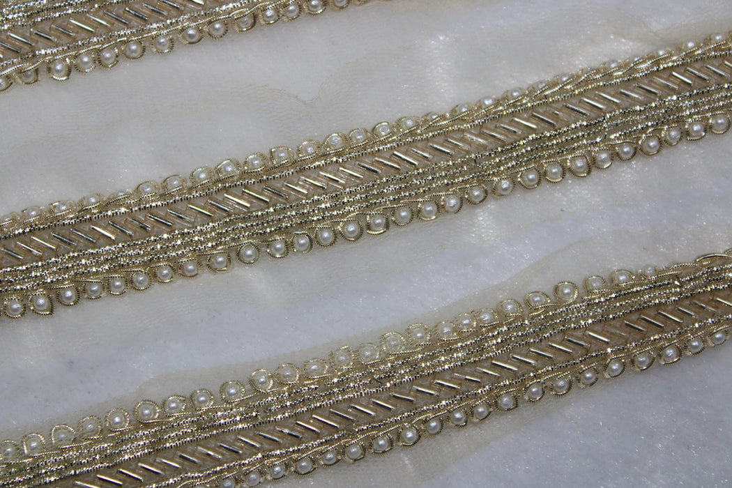 Ivory Shimmer: Golden and White Pearl Embellished Trim