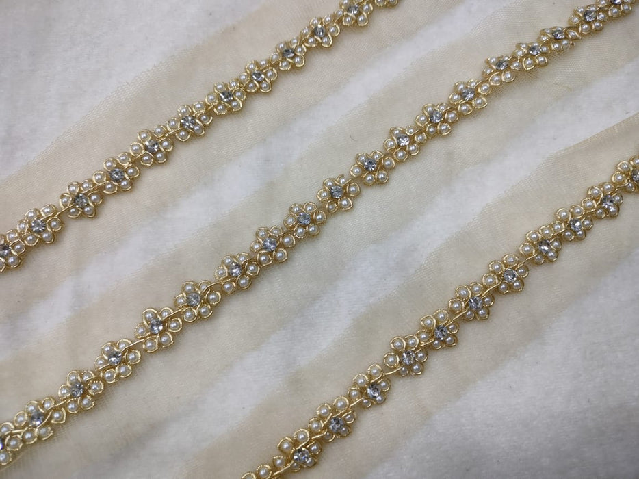 Golden Bloom: Floral Pearl Handwork with Gold Zari