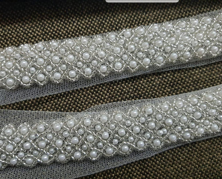 Silver Elegance: Handcrafted White Pearl Trim with Silver Cutdana Detai