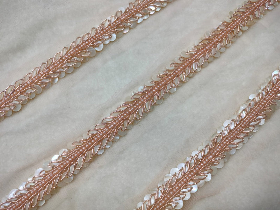 Rose Gold Elegance: Pearls and Zari Embellishments