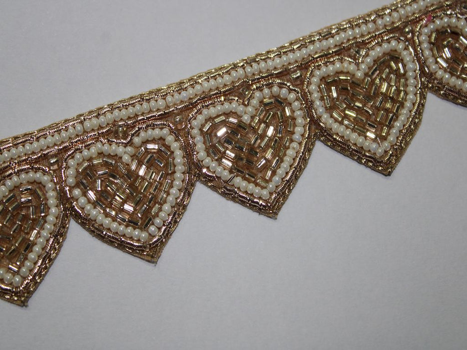 Elegant Embrace: White Pearl with Heart-Shaped Rose Gold Cut Dana Trim