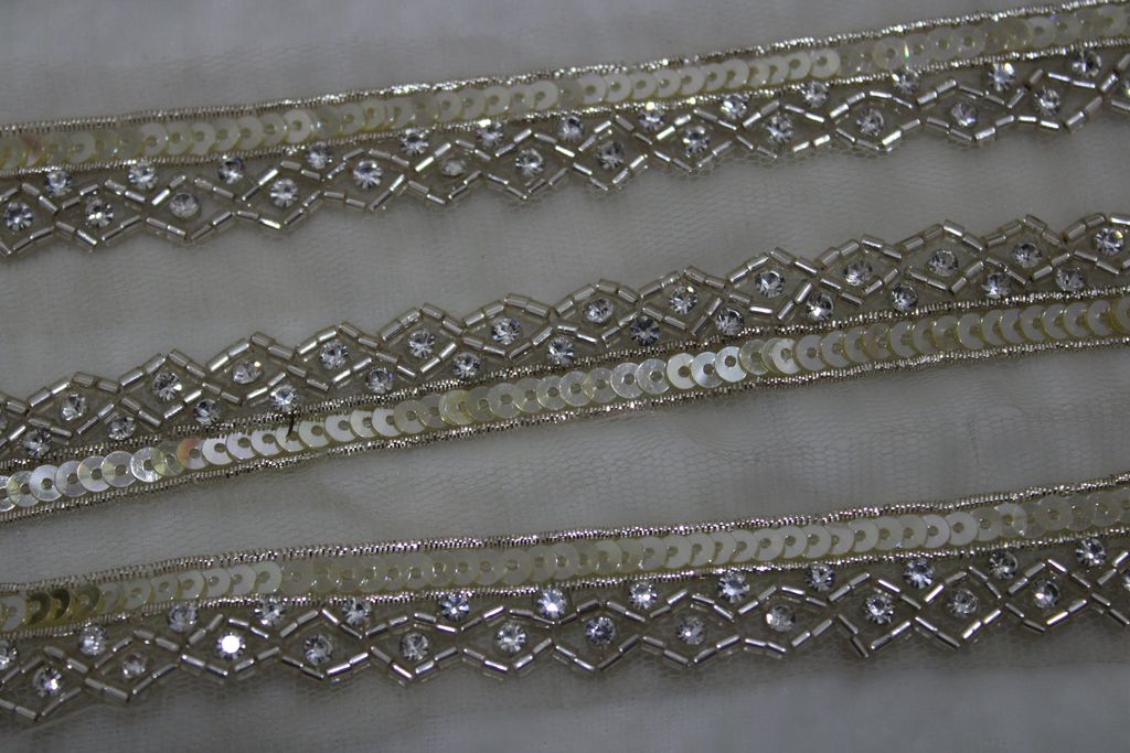 Golden Elegance: Zari Handwork Trim in Soft Hue