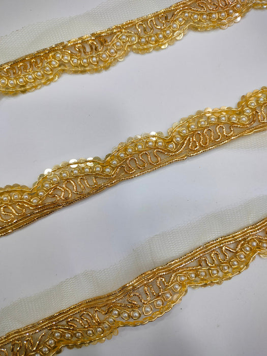 Golden Gleam: Scalloped Light Golden Handwork Trim