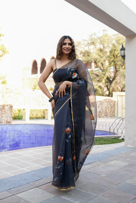 Divine Ink Drapes (Handpainted Black Organza Zari border saree)