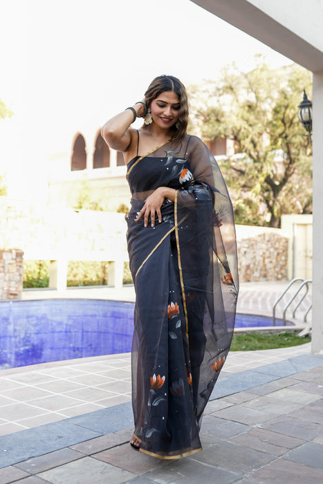 Divine Ink Drapes (Handpainted Black Organza Zari border saree)