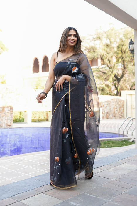 Divine Ink Drapes (Handpainted Black Organza Zari border saree)