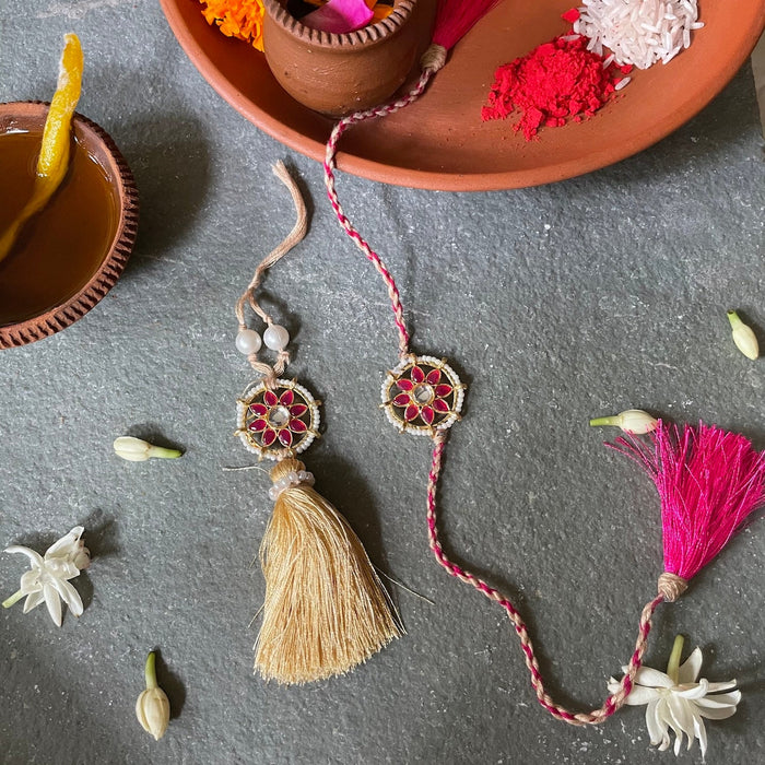 Kundan Rakhi Lumba Set- Golden and Hot Pink