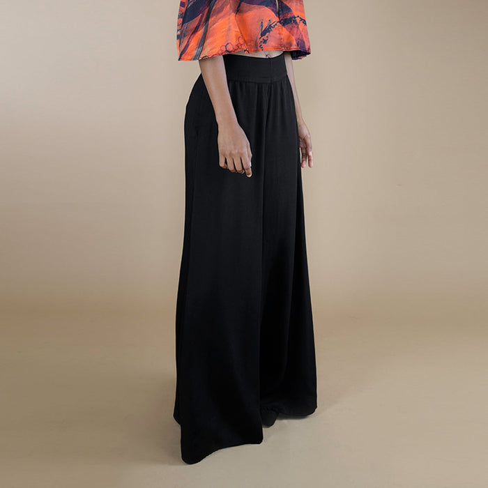 a high waist black flared women pants made from organic lotus stem silk fabric