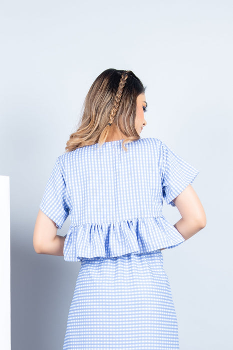 CORNFLOWER BLUE CHESS RUFFLE HEM TOP