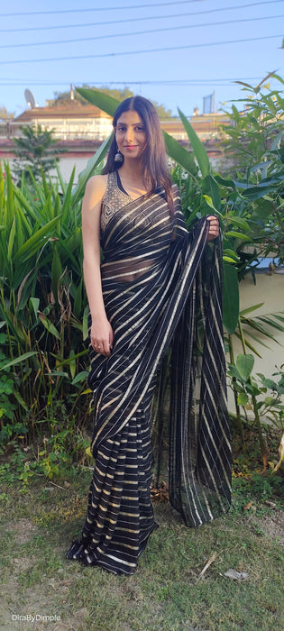 Midnight Magic (Pure Georgette Zari Striped Saree)