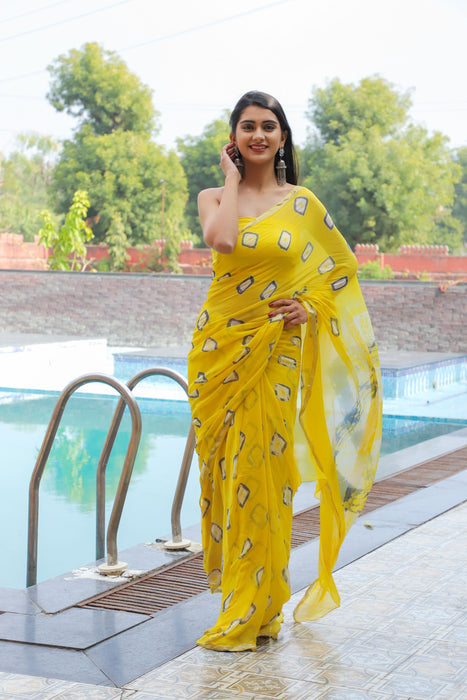 Filmy Tracey (Yellow Bandhej Chiffon Saree with Zari Border)