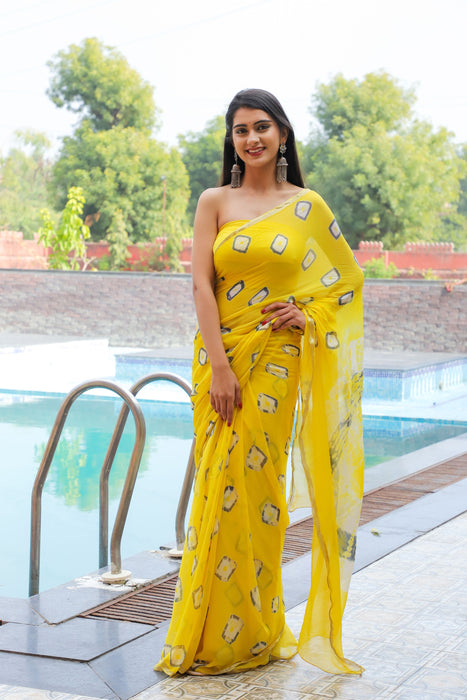 Filmy Tracey (Yellow Bandhej Chiffon Saree with Zari Border)