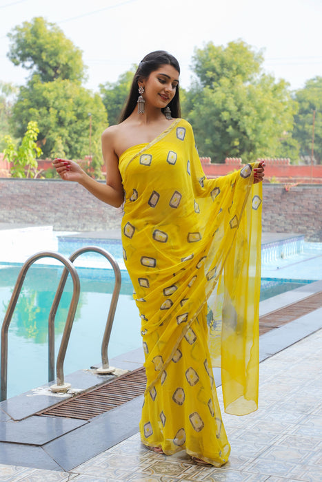 Filmy Tracey (Yellow Bandhej Chiffon Saree with Zari Border)