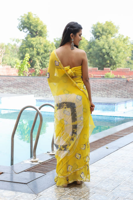 Filmy Tracey (Yellow Bandhej Chiffon Saree with Zari Border)