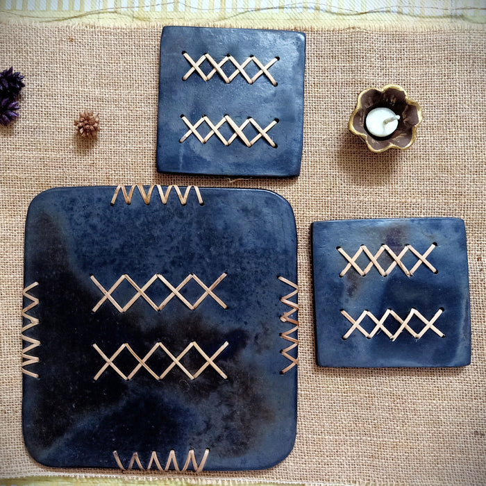 Longpi Black Pottery Trivet And Coaster Set