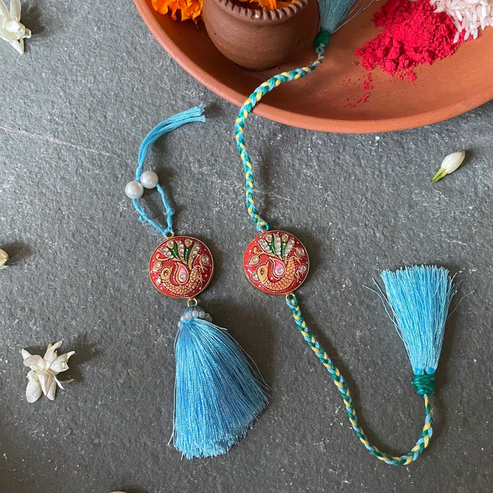 Tanjore Rakhi Lumba Set - Orange stone and Blue