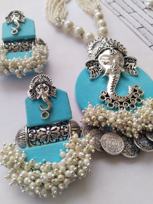 Baby Blue Silver Pearls Ganpati Necklace And Earring Set
