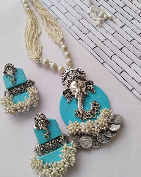 Baby Blue Silver Pearls Ganpati Necklace And Earring Set