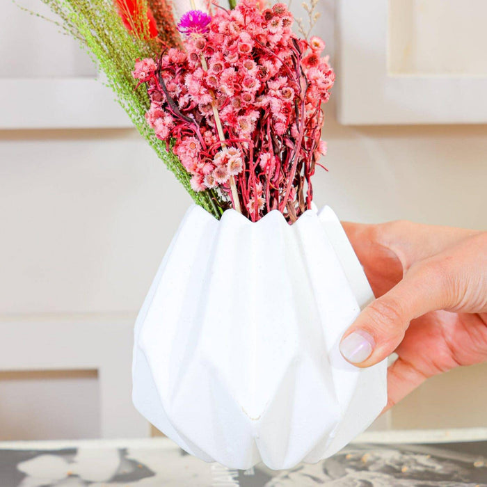 Mini white geometrical vase with spring bunch