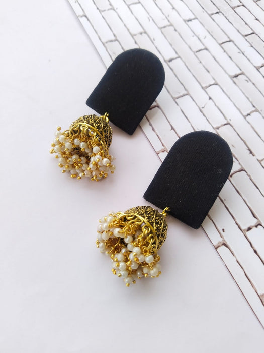 Plain black earrings with golden bottom